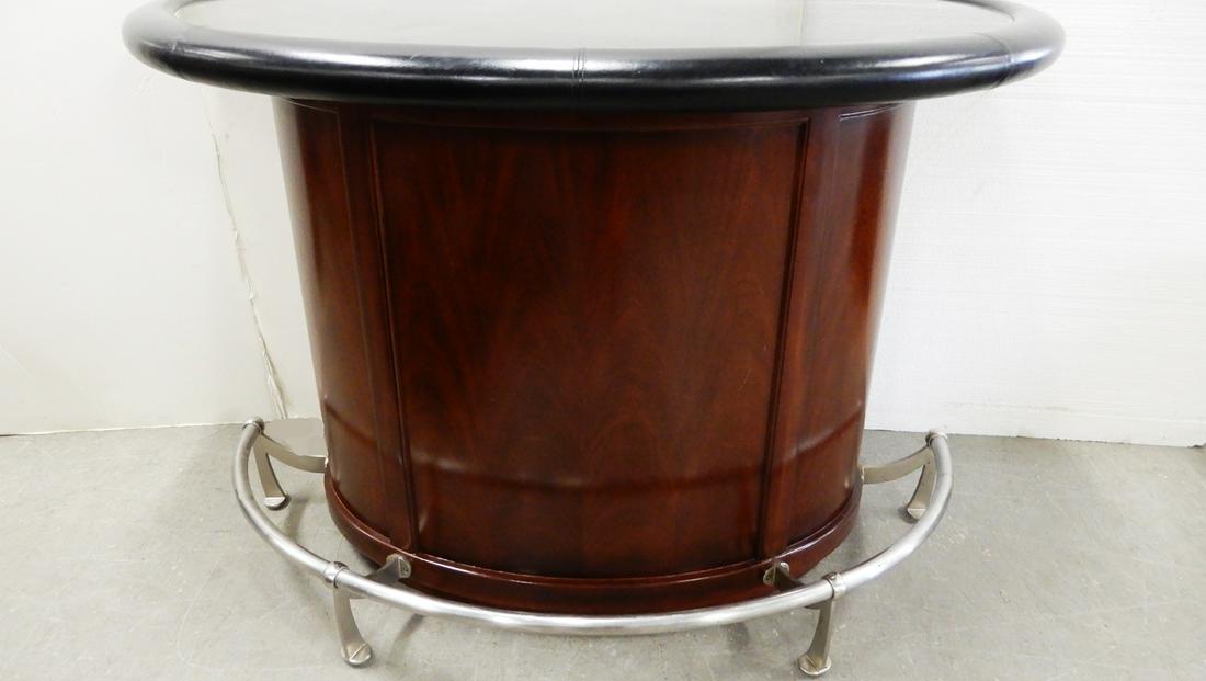 Bogart by Thomasville demi-lune mahogany bar: Bogart by Thomasville demi-lune mahogany bar, granite top with leather surround, stainless steel foot rest