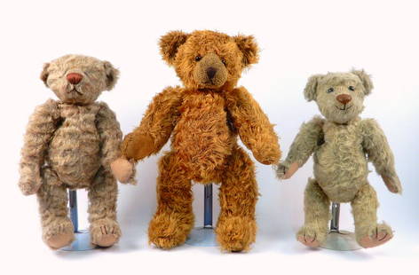 Three teddy bears: Three teddy bears, 16" jointed mohair teddy bear on metal stand, 14" curly white jointed teddy bear signed Lc on bottom of foot, and 13" white teddy bear with leather nose