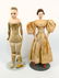 Two early paper mache dolls with kid bodies