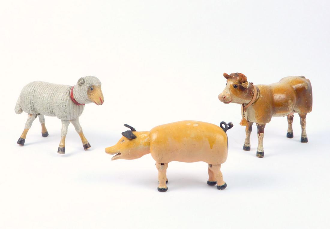 Three Schoenhut Barnyard animals, cow, sheep, and pig. (1 of 2)