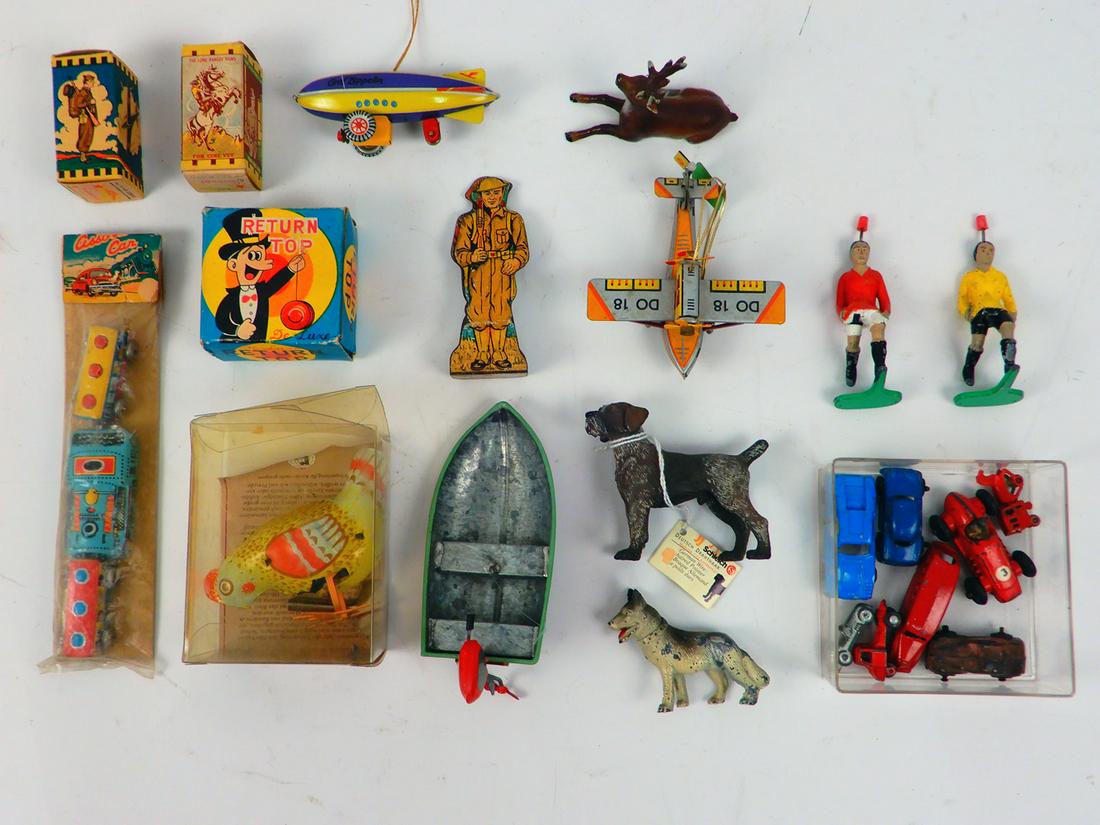 Assorted metal and tin toys. (1 of 1)