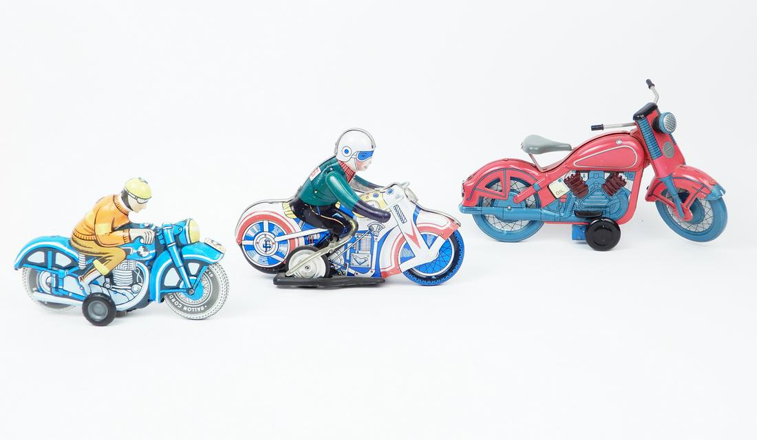 Three Chinese tin litho motorcycles. (1 of 8)