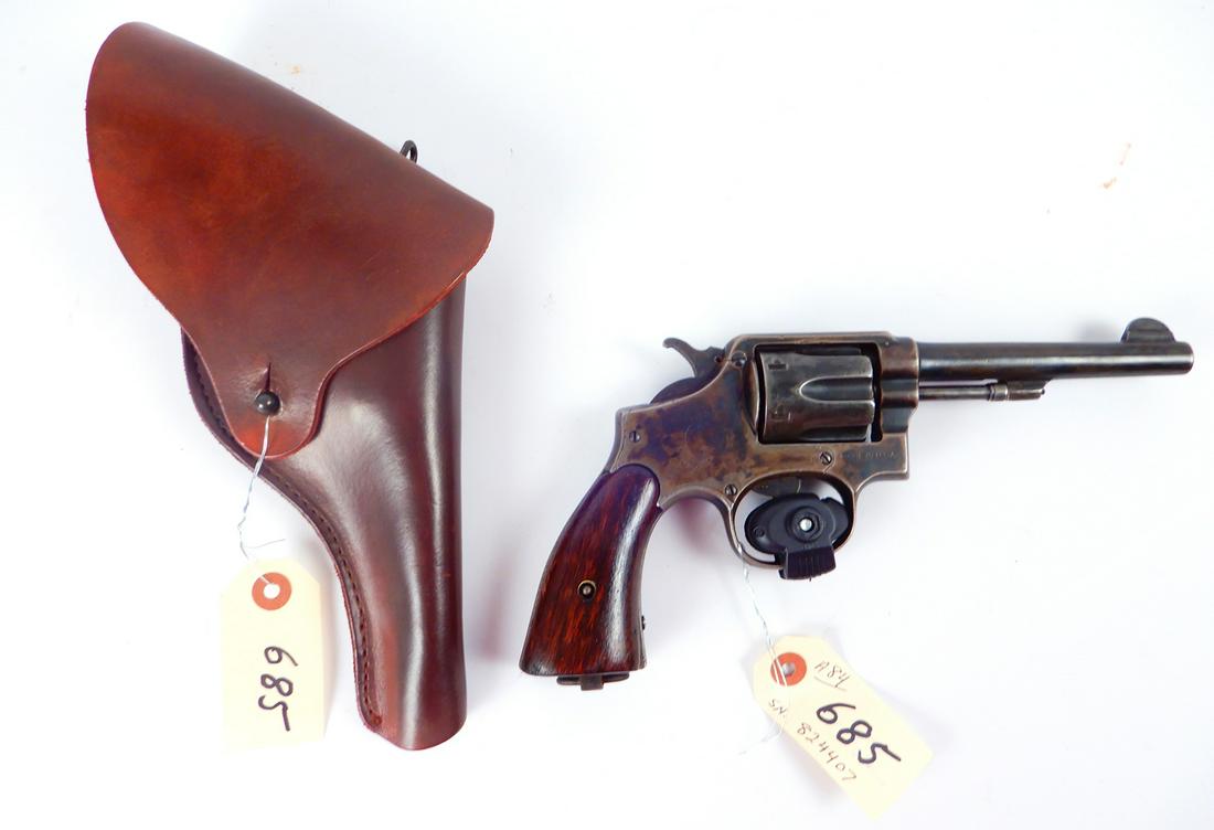 Smith & Wesson .38 caliber revolver: Smith & Wesson .38 caliber revolver, double action, 6 shot, patent date Sept. 14, 1900, Serial Number 824407, barrel length 4 3/4", overall length 9 3/4", heat treated finish with Cathey Enterprises b