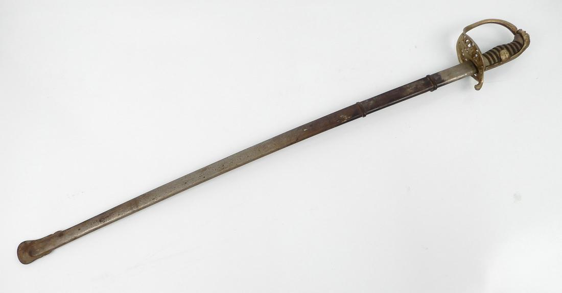 Norwegian Army Officer sword in scabbard: Norwegian Army Officer sword in scabbard, lions head pommel, shark skin and wire grip, crossguard design of lion in shield surrounded by three dragons, blade length 32 1/4", overall length 38 1/8"