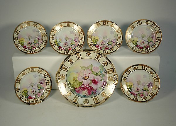 Nippon hand painted dessert set, seven piece, floral: Nippon hand painted dessert set, seven piece, floral decoration with gilt borders, early 20th C., no visible defects