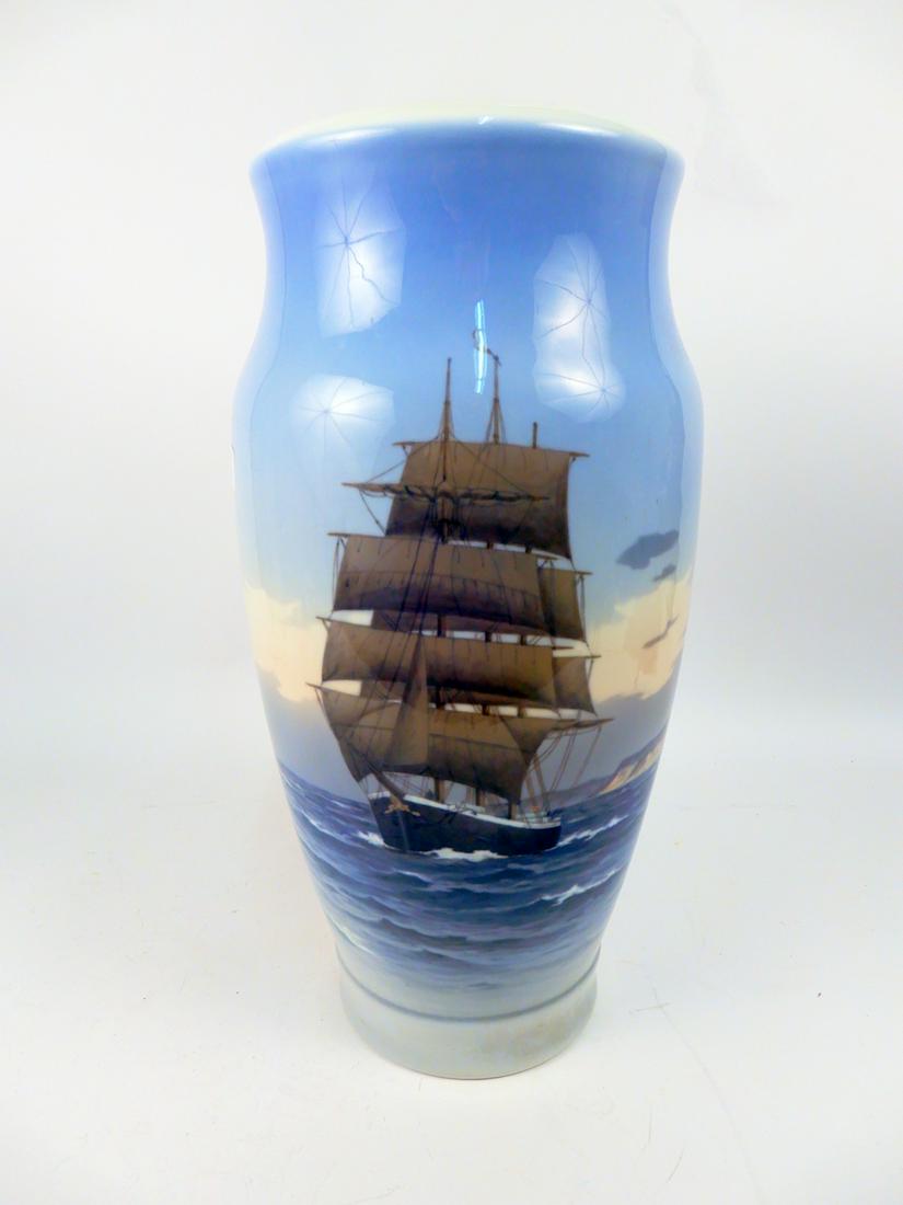 Royal Copenhagen porcelain vase: Royal Copenhagen porcelain vase, numbered 2108 131 on bottom, clipper ship at sea depicted on front, 17" (height)