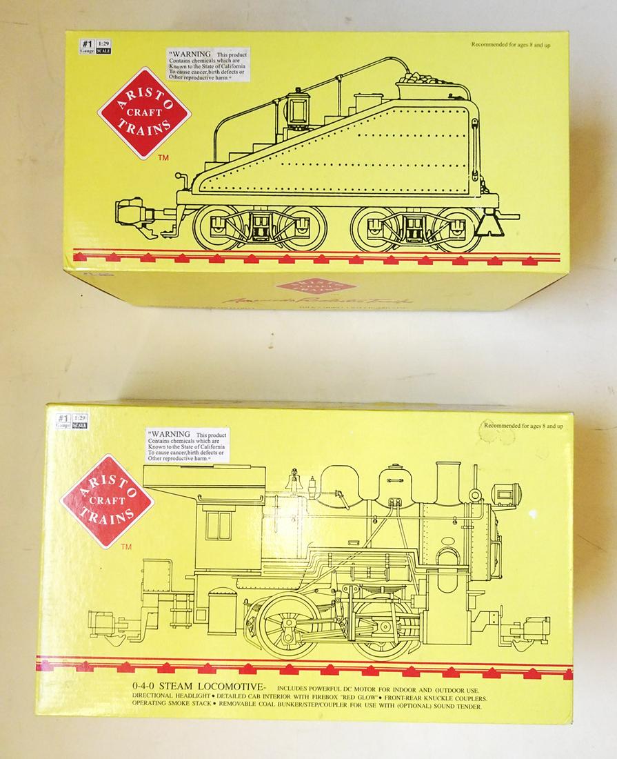1990's Aristo Craft Trains "G" gauge 0-4-0 steam engine: 1990's Aristo Craft Trains "G" gauge 0-4-0 steam engine and tender in original boxes. Steam engine is black plastic and lettered for the PRR and numbered 1201. The tender is black plastic and lettered