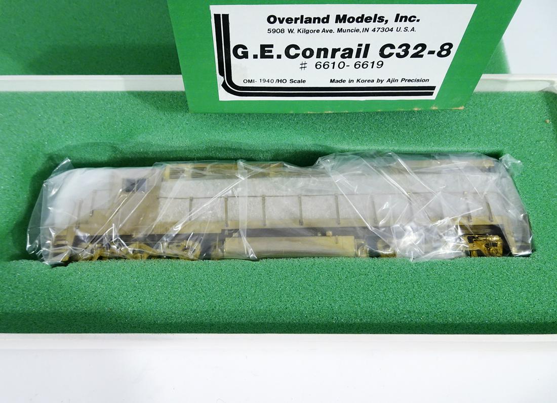 1990's Overland Models brass GE Conrail C32-8 HO gauge: 1990's Overland Models brass GE Conrail C32-8 HO gauge diesel in original box. Engine is still in original interior plastic. Original inserts. Approx. 9" long.