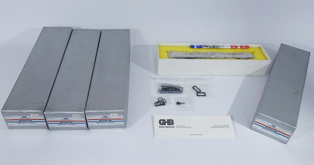 Four early 2000's unpainted GHB International Models: Four early 2000's unpainted GHB International Models HO gauge AMTRAK Amfleet 2 passenger cars in original boxes. There are 3 coaches and one lounge car. These cars were made by Samhongsa (Korea) for G