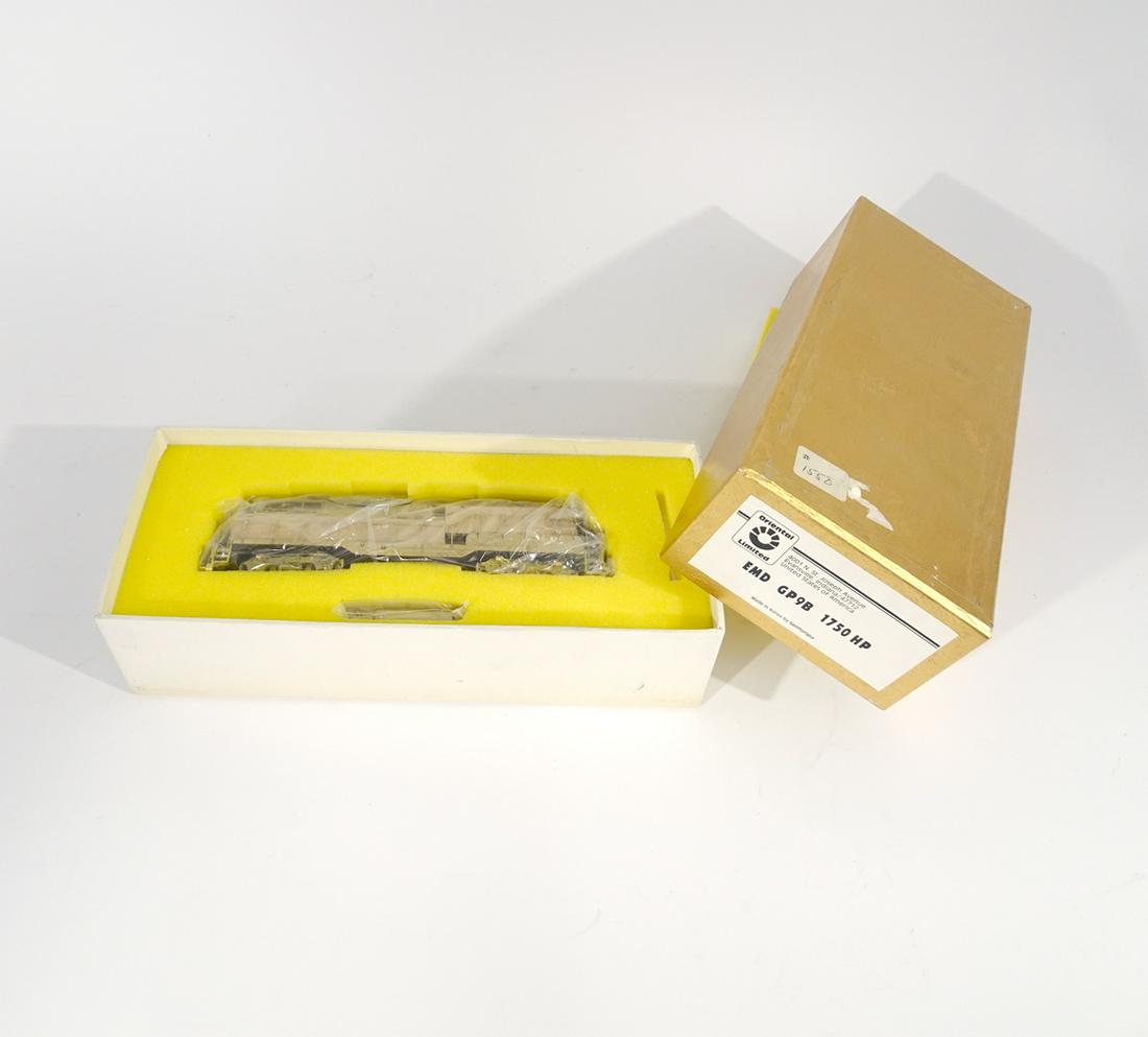 1990's Oriental Limited Models by Samhongsa (Korea): 1990's Oriental Limited Models by Samhongsa (Korea) unpainted brass HO gauge EMD GP9-B 1750 HP diesel engine in original box. This is a rare "Calf " style, no hood engine). This is a powered unit. The