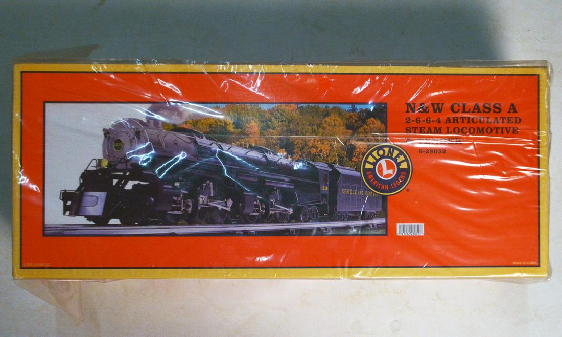 2000's Lionel O gauge N&W class A 2-6-6-4 Articulated: 2000's Lionel O gauge N&W class A 2-6-6-4 Articulated Steam Engine and Tender in original box with shipping box. 31", this has never been removed from its original box. Features a die-cast metal locom