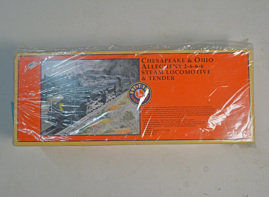1999 Lionel O gauge #28011 C&O Allegheny 2-6-6-6 Steam: 1999 Lionel O gauge #28011 C&O Allegheny 2-6-6-6 Steam engine and tender in sealed original box. This articulated model features a cast metal engine and tender marked for the C&O, wireless tether, rai