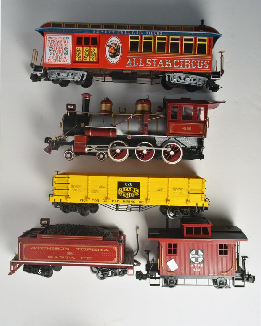 1990's Bachmann "G" gauge steam engine set with Emmet: 1990's Bachmann "G" gauge steam engine set with Emmet Kelly Circus coach. Set consists of a red and silver Santa Fe 4-6-0 steam engine and tender, a yellow Gold Belt Line gondola, a red Santa Fe 4 whe