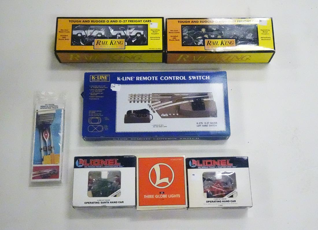 One lot of Modern O gauge trains and accessories by: One lot of Modern O gauge trains and accessories by Lionel and MTH in original boxes. The lot consists of a Lionel #18403 Santa hand car, a Lionel #18401 hand car, a set of #12926 Lionel original box