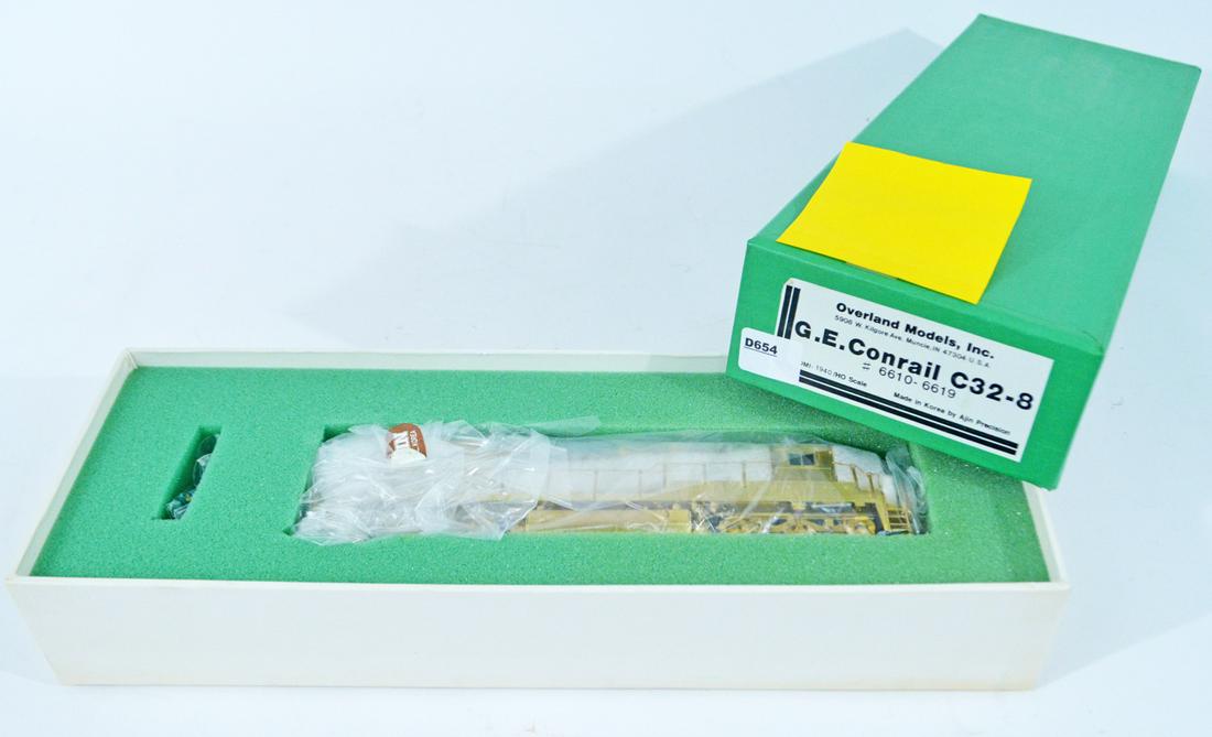 1990's Overland Models by AJIN (Korea) unpainted brass: 1990's Overland Models by AJIN (Korea) unpainted brass GE Conrail C32-8 diesel locomotive in original box. Engine measures 9" long. Still wrapped inside its original box.