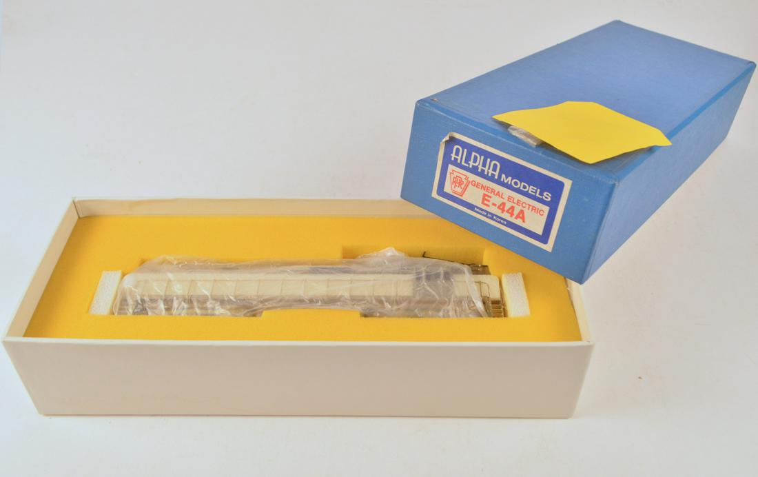 1980's ALPHA Models (Korea) unpainted brass HO gauge: 1980's ALPHA Models (Korea) unpainted brass HO gauge PRR General Electric E-44A electric locomotive in original box. Engine is about 10" long with dual forward pantographs.
