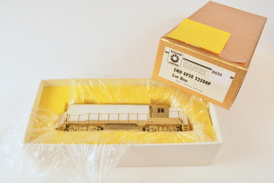 1990's Oriental Limited by Samhongsa (Korea) unpainted: 1990's Oriental Limited by Samhongsa (Korea) unpainted brass HO gauge EMD GP30 2250HP low hood diesel engine in original box. Diesel is 8" long. Still wrapped in factory plastic.