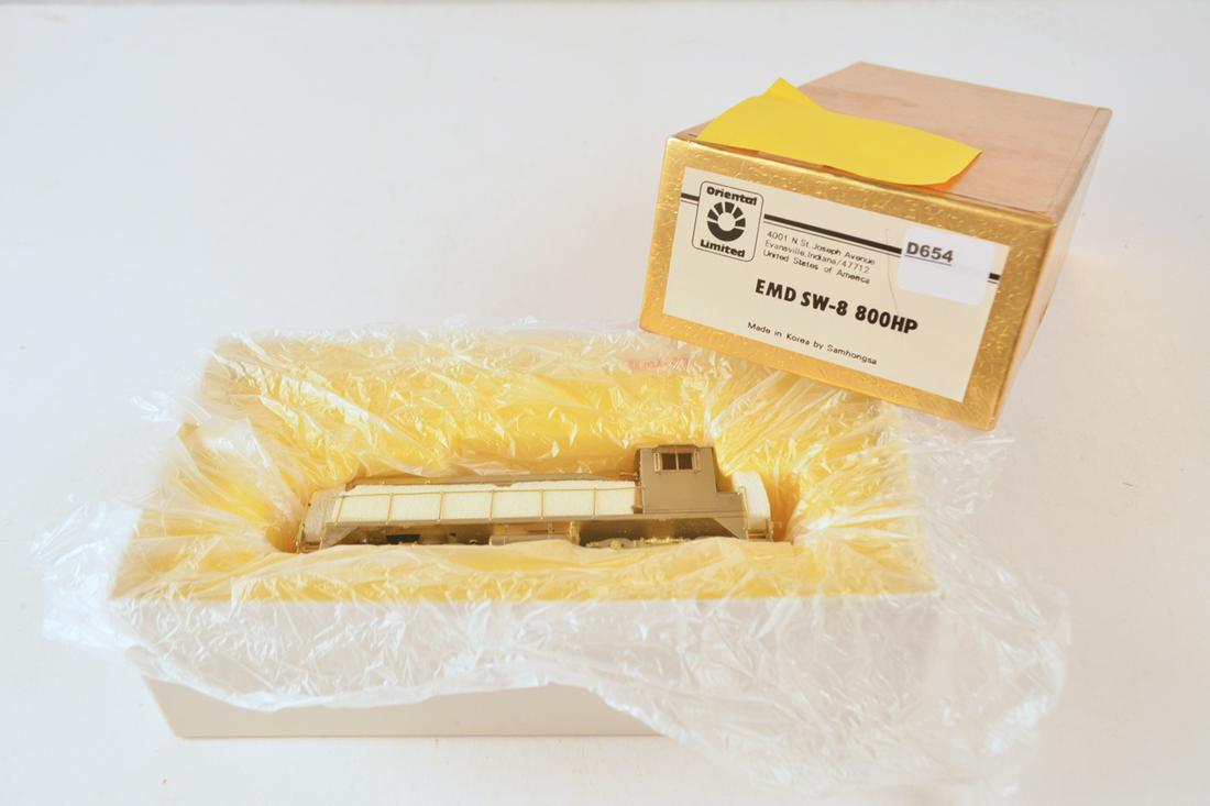 1990's Oriental Limited by Samhongsa (Korea) unpainted: 1990's Oriental Limited by Samhongsa (Korea) unpainted brass HO gauge EMD SW-8 800hp diesel engine in original box. Engine is about 6" long.