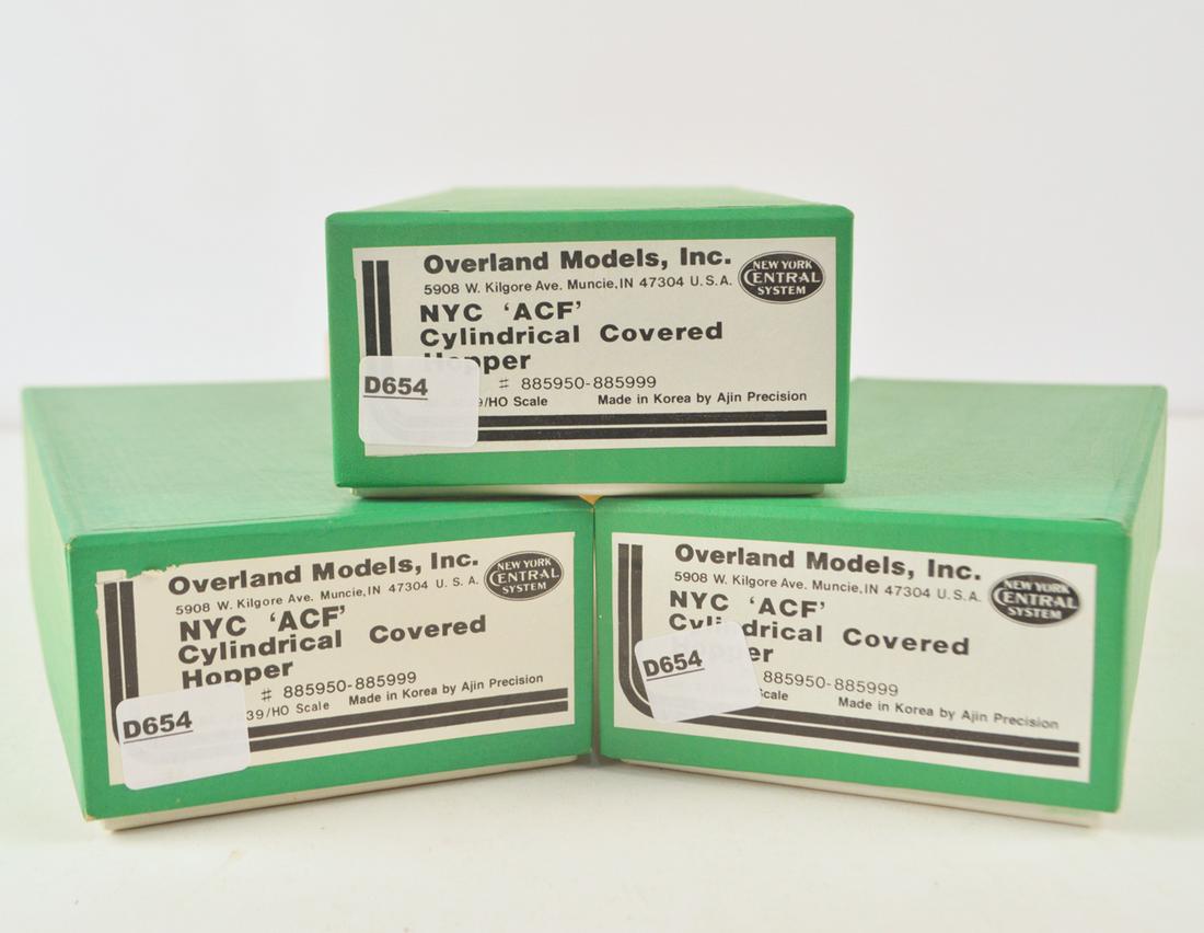 Three 1990's Overland models by AJIN (Korea) unpainted: Three 1990's Overland models by AJIN (Korea) unpainted brass HO gauge NYC "ACF" cylindrical hoppers in original boxes.. All three still wrapped in factory plastic.