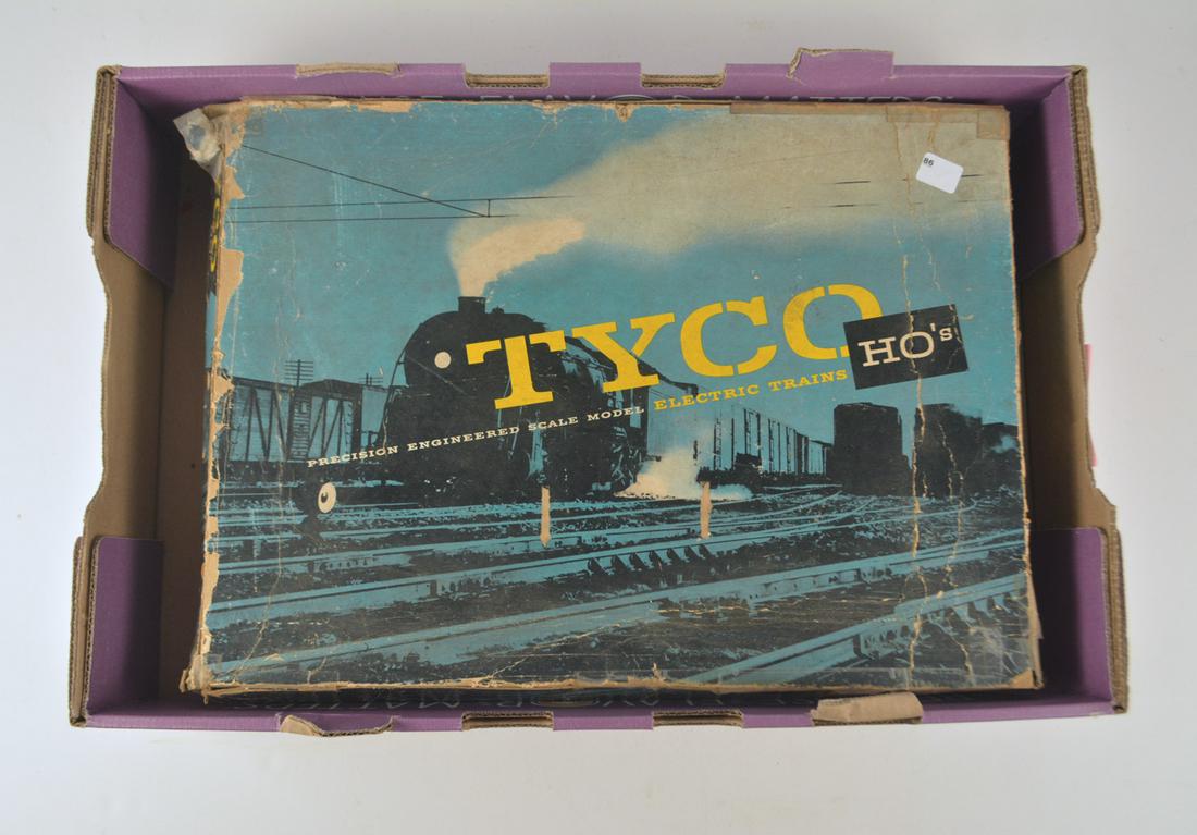 Three 1950's-1960's TYCO/Mantua HO gauge train sets in: Three 1950's-1960's TYCO/Mantua HO gauge train sets in set original boxes. Mantua HO trains Booster train set which consists of an 0-4-0 steam engine (drive rods are loose in bag), a flat car with no