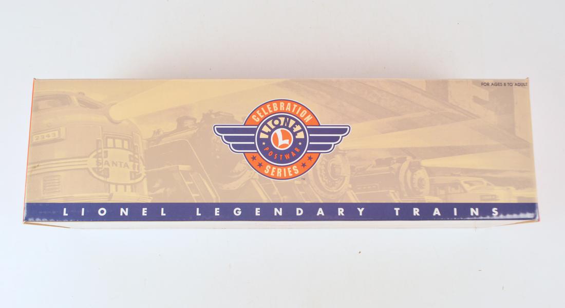 1999 Lionel O gauge #18322 Trainmaster Lackawanna FM: 1999 Lionel O gauge #18322 Trainmaster Lackawanna FM diesel unit in original box with shipping box. Copy of the post war FM unit with modern up grades such as Pullmor motors, railsounds, command contr