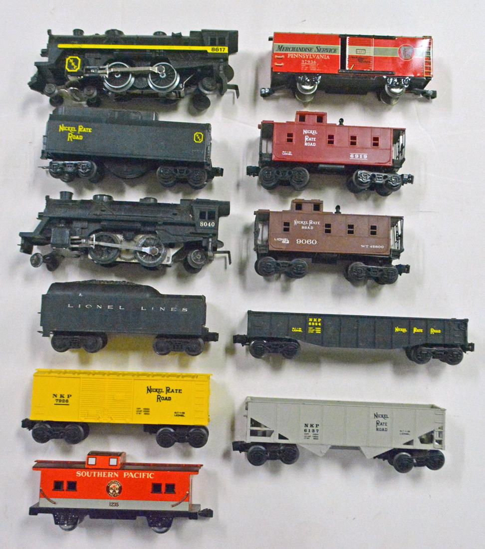 Mixed lot of O gauge trains by Lionel and Marx.: O gauge trains by Lionel and Marx, mixed lot by companies and eras. The lot consists of a #8617 black die cast metal NPR steam engine with smoke and black plastic "sound of choo choo" tender, #8040 Li