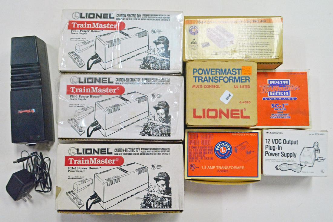 1990's-2000's Lionel Trainmaster transformer items in: 1990's-2000's Lionel Trainmaster transformer items in original boxes. Lot consists of three #12866 PH-1 power supply, #14179 TMCC Trainmaster Command Control track controller (TPC), #12914 Switch and 