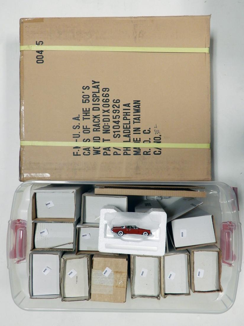 Twelve 1980's Franklin Mint 1:43 scale die cast and: Twelve 1980's Franklin Mint 1:43 scale die cast and plastic cars in original boxes, 1950's muscle car series. All are mint. Some still sealed. Some examples of the unsealed cars include a pink Cadilla