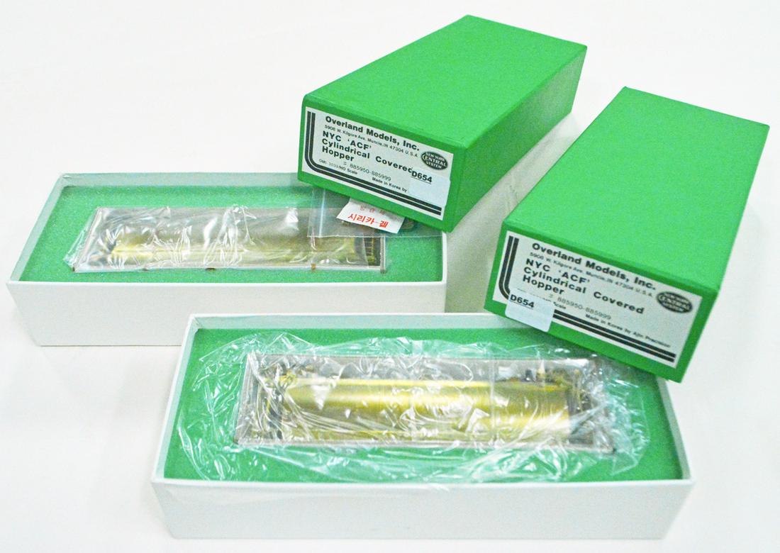 Two 1990's Overland Models by AJIN (Korea) unpainted: Two 1990's Overland Models by AJIN (Korea) unpainted brass HO NYC "ACF" cylindrical hoppers in original boxes. Hoppers are about 7" long.