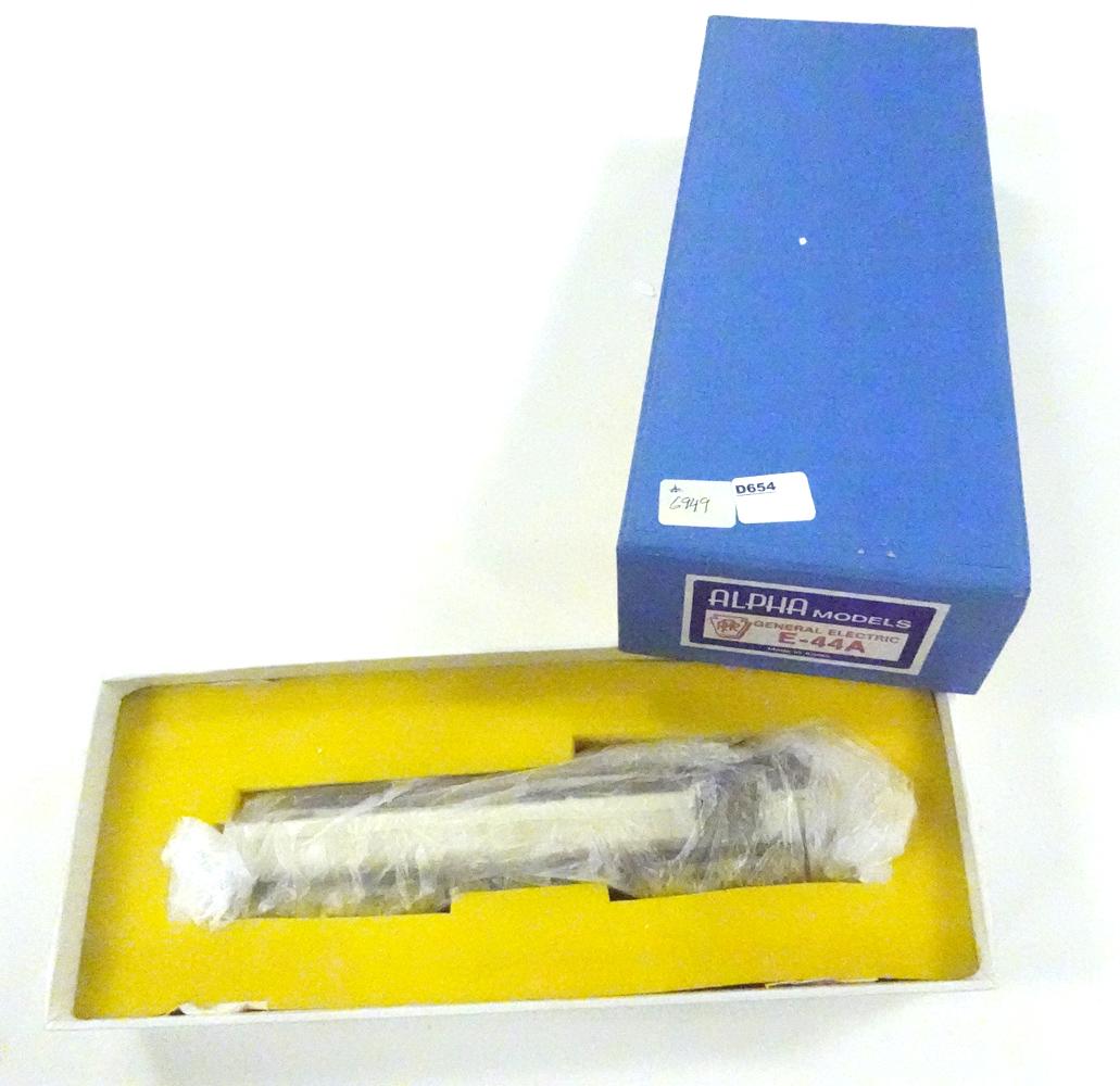 1980's Alpha Models (Korea) unpainted brass HO gauge: 1980's Alpha Models (Korea) unpainted brass HO gauge PRR General Electric E-44A electric locomotive in original box. Engine is 10" long with dual forward pantographs.