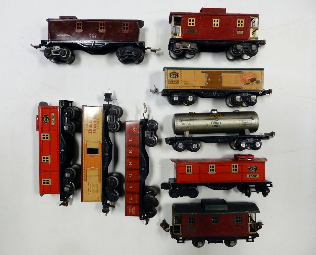 Nine 1930's Lionel O gauge tin freight cars.: Nine 1930's Lionel O gauge tin freight cars. Five cabooses # 1682,2682, 2682 (brown NYC), 657, and 807. Two Baby Ruth box cars # 2679 yellow with Tuscan roof and 1679 yellow with green roof. #1680 LL 