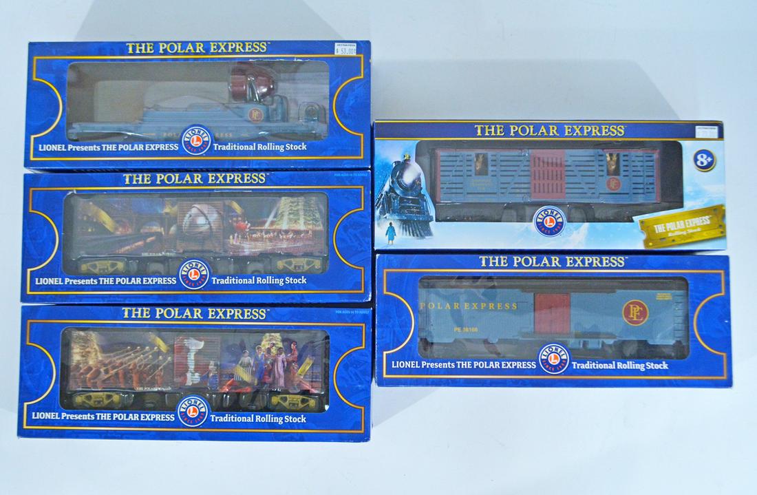 Five 2000's Lionel O gauge Polar Express add-on freight: Five 2000's Lionel O gauge Polar Express add-on freight cars in original boxes. The lot consists of #36166 PE wood-sided reefer, #1928410 PE operating reindeer car, #83943 PE Story boxcar, #83647 PE B