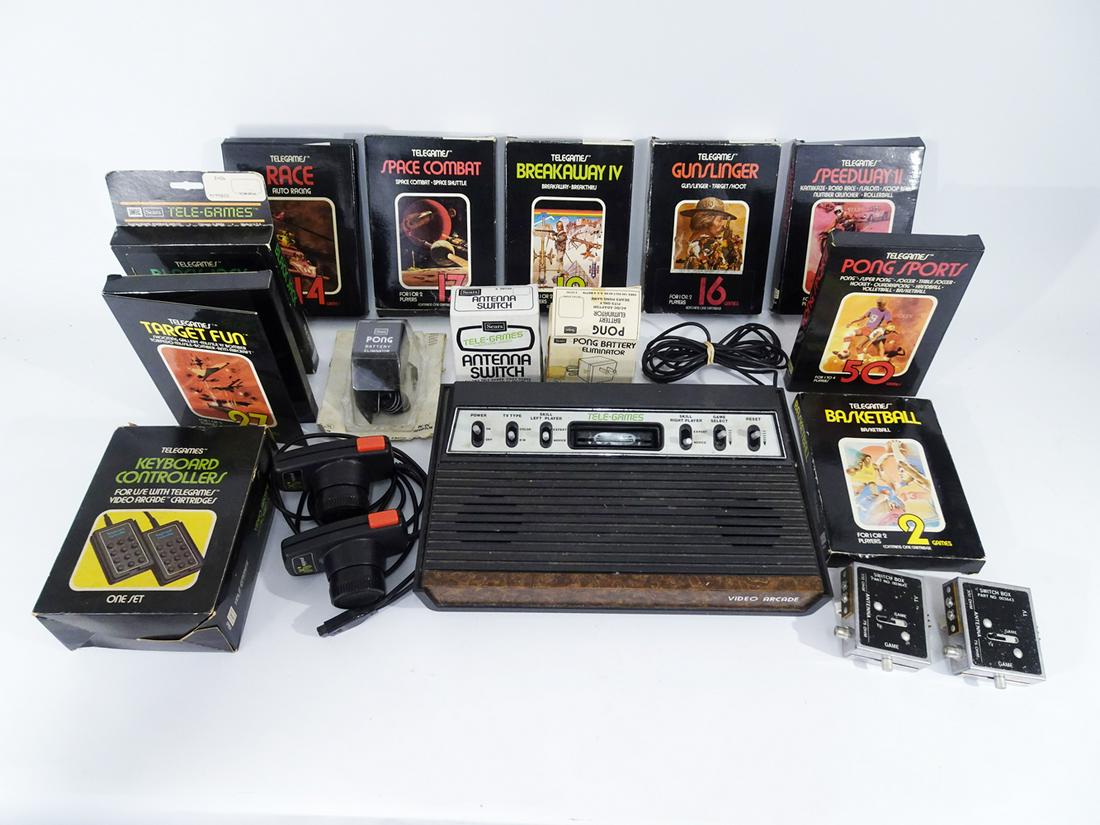 Atari Tele-games 2600 console and ten video games.: Atari Tele-games 2600 console and ten video games. Console with controllers and ten video games in original boxes, all games are in their original boxes and all have their correct manual except Pong S
