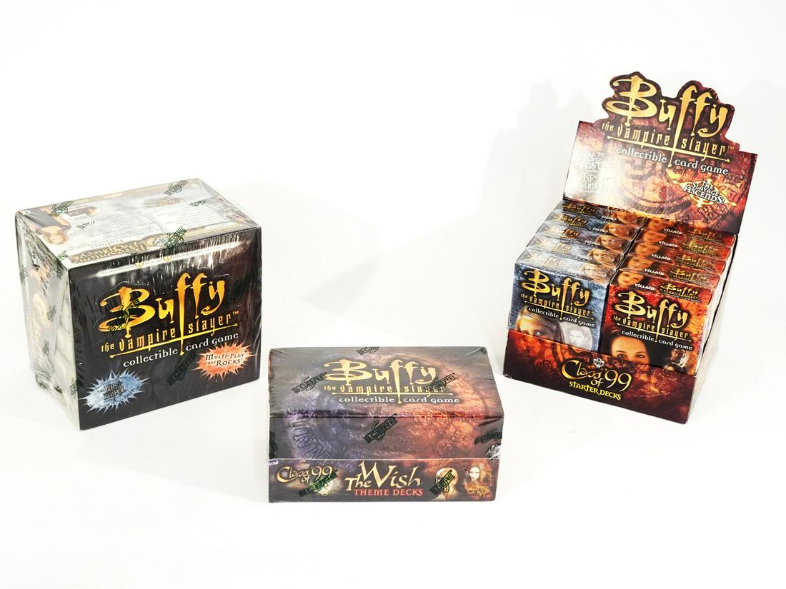 Three boxes of 2000's Buffy the Vampire Slayer: Three boxes of 2000's Buffy the Vampire Slayer collectible card game packs in original sealed boxes. The Pergamum Prophecy, the Slayage Ascends, and Class of 99.