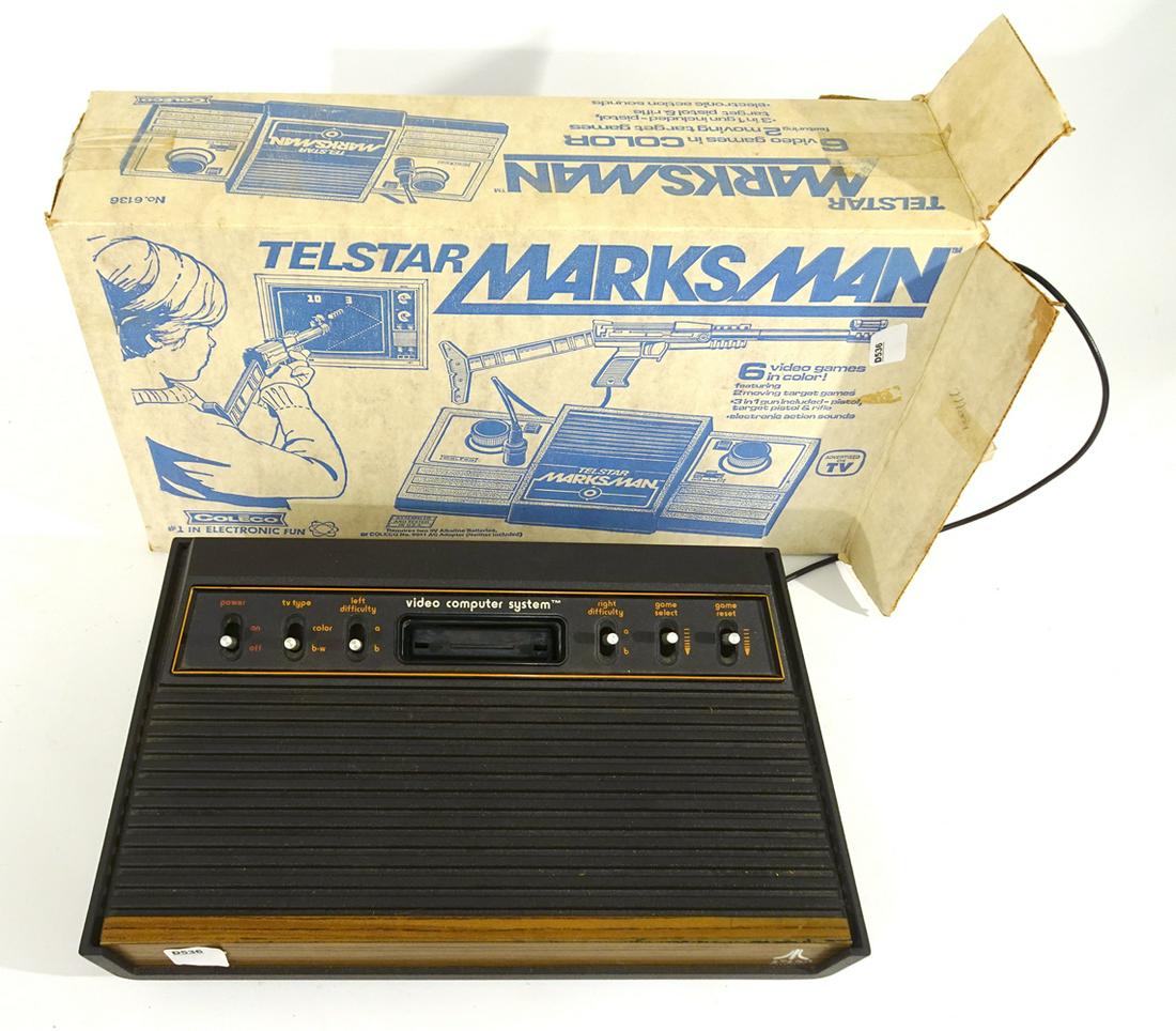 1980's Atari Telstar Marksman console set with original: 1980's Atari Telstar Marksman console set with original box. Has two-piece console and gun.