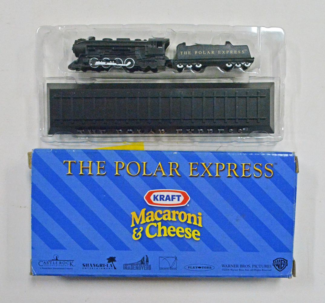 1990's Dept. 56 Village Streetcar set by Bachmann and a: 1990's Dept. 56 Village Streetcar set by Bachmann and a Kraft Polar Express premium engine and tender in original boxes. The trolley set has the trolley and track, but no power pack. The Polar Express