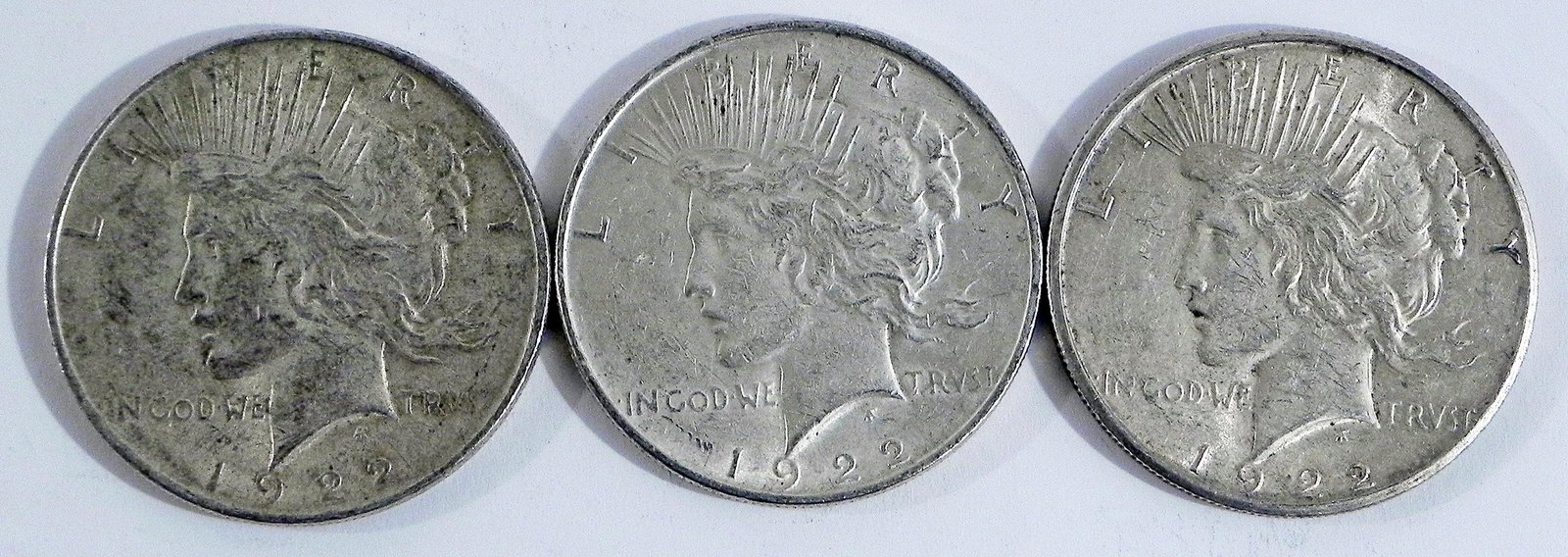 Three 1922 Peace silver dollars (1 of 2)