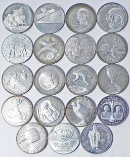 Nineteen sterling silver medallions: Nineteen sterling silver medallions. 16.380 troy oz.