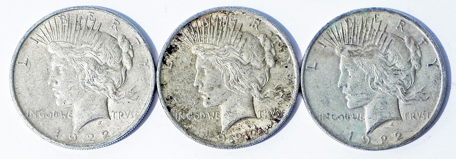 Three 1922 Peace silver dollars (1 of 2)