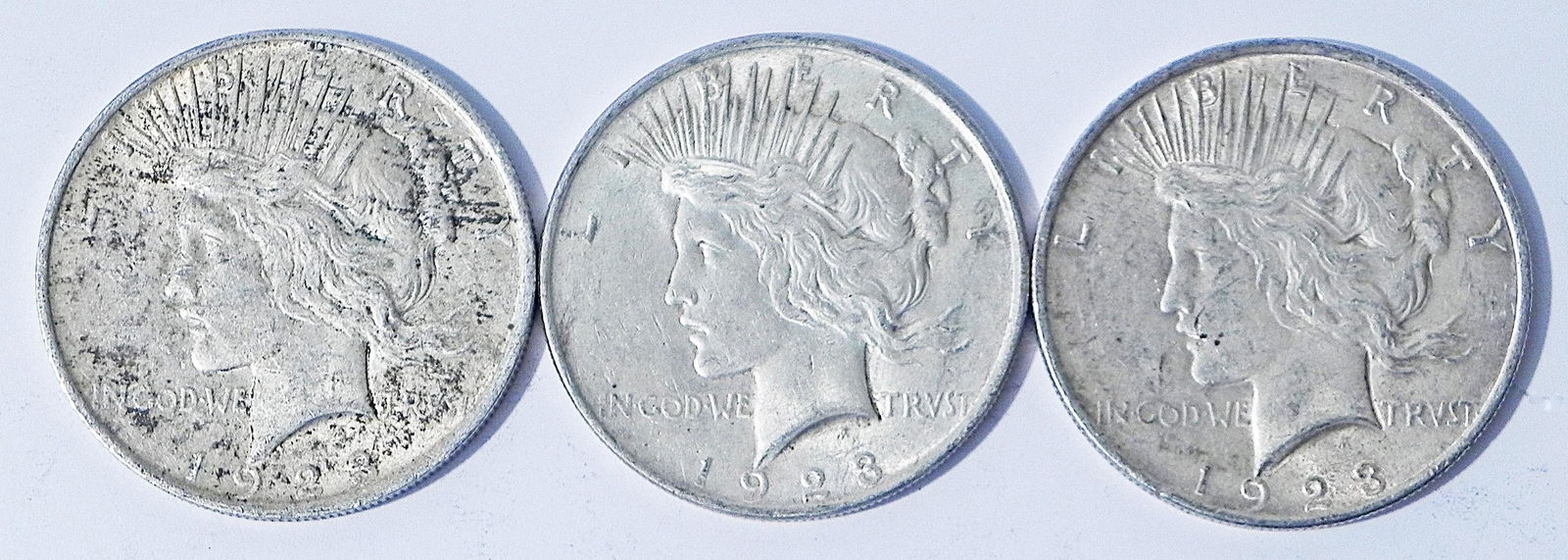 Three 1923 Peace silver dollars (1 of 2)