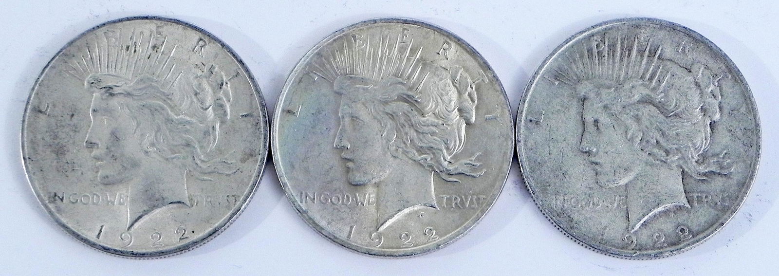 Three 1922 Peace silver dollars (1 of 2)