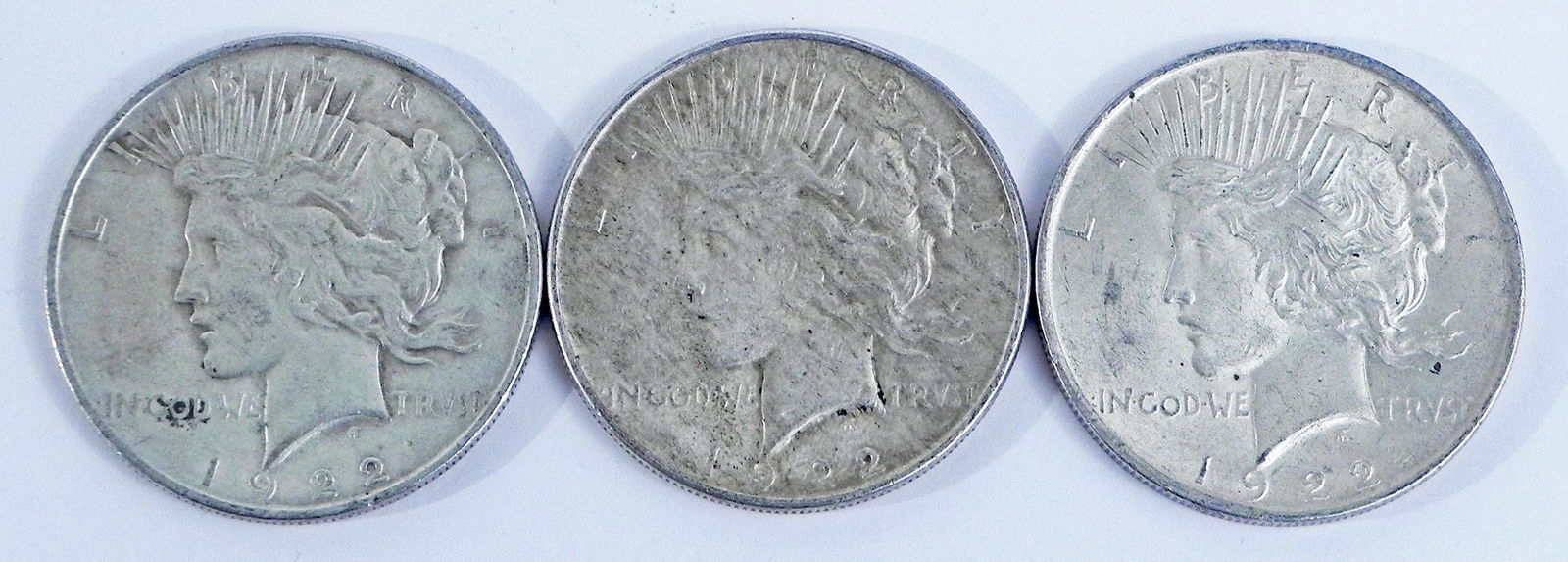 Three 1922 Peace silver dollars (1 of 2)