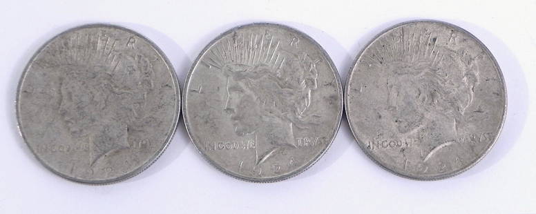 Three 1924 Peace silver dollars: Three 1924 Peace silver dollars, ungraded