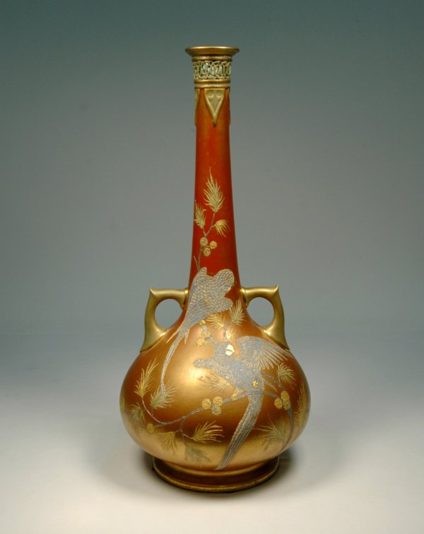 Royal Worcester handled vase, late 19th C, gilt ena: Royal Worcester handled vase, late 19th C, gilt enamel decoration, birds and branches, "Patent Metallic" stamp on bottom, 16" tall, body is 8" diameter, drilled hole in bottom. No visible defects.