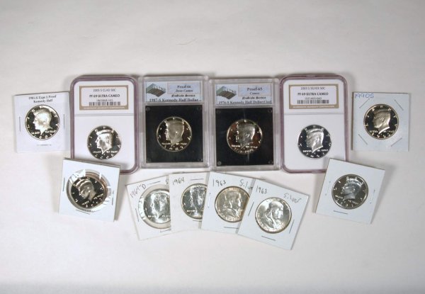 Thirteen United States half dollars including two : Thirteen United States half dollars including two 1963 silver Ben Franklins, two 1964 silver Kennedys, five silver clad Kennedys, one 1976 S Kennedy proof 65, one 1987 Kennedy proof 66 deep cameo, one