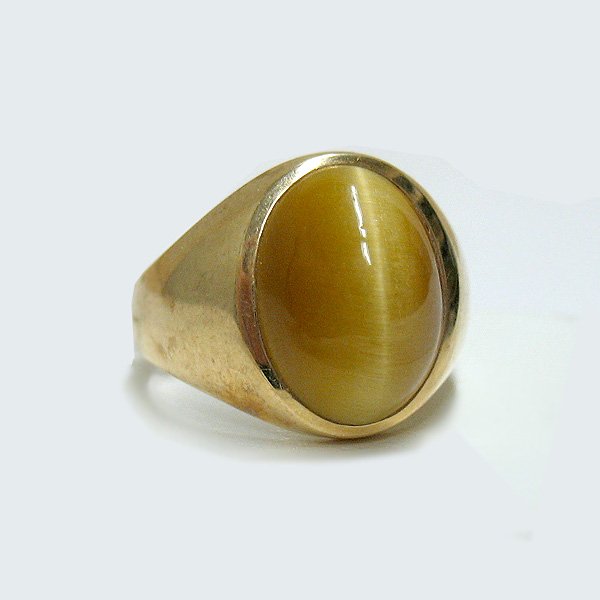Man's 10k gold ring with oval cabochon cat's eye, 