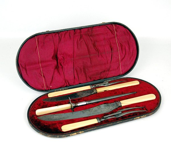 English five piece carving set with ivory handles,: English five piece carving set with ivory handles, hallmarked Encore Thomas Turner and Comfy, Suffolk Works, Sheffield, in a velvet lined fitted case with sterling plaque on lid, mid 19th C, case meas