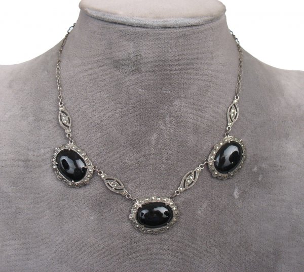 Art Deco sterling silver and marcasite necklace, t: Art Deco sterling silver and marcasite necklace, three oval sections with black glass stones surrounded by marcasites, each section measures 1" wide x 3/4" high, 15 1/2" long, no visible defects
