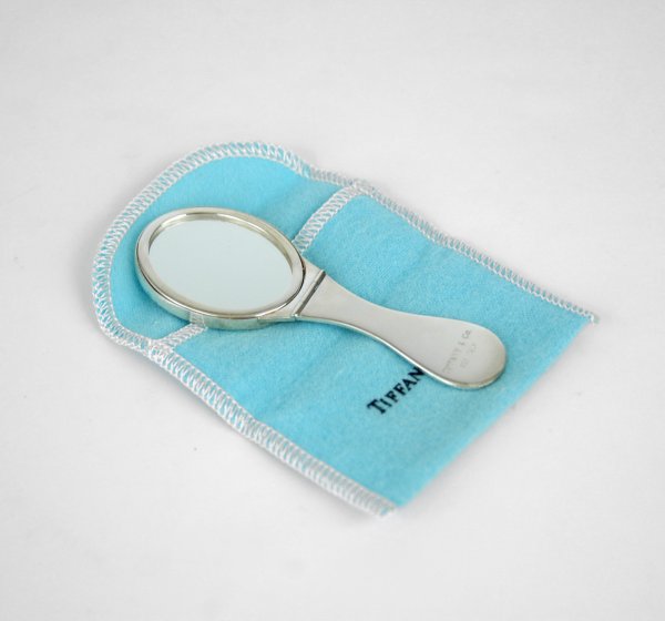 Tiffany sterling silver folding hand mirror, 4" lo: Tiffany sterling silver folding hand mirror, 4" long, open, marked Tiffany & Co. 925 Italy, includes blue felt Tiffany bag, no visible defects