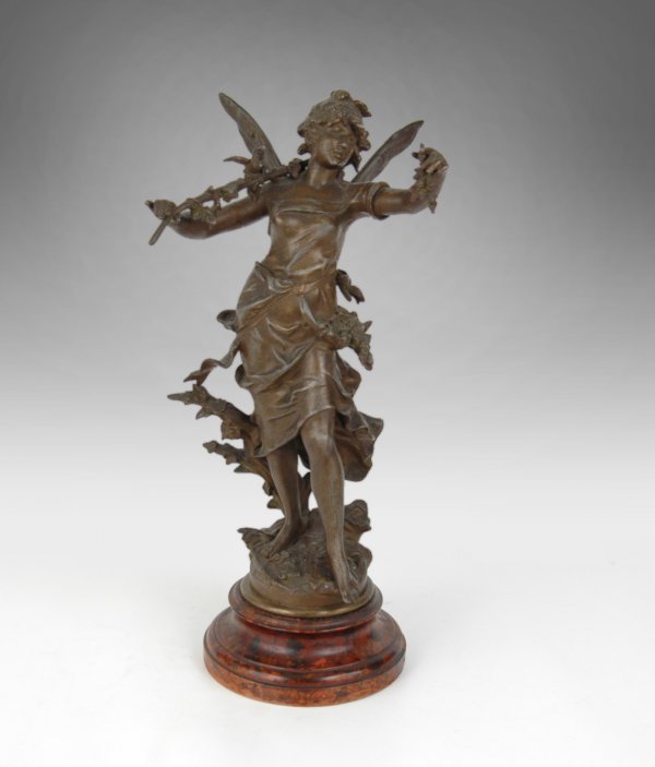 Louis Moreau (after), Art Nouveau bronze finish sp: Louis Moreau (after), Art Nouveau bronze finish spelter figure of a nymph holding fruit, flowering branch and bird, signed on base Louis Moreau, on attached round wooden base. Measures 17" high x 8 3/